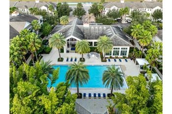 Resort-style, heated swimming pool with cabanas